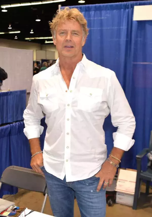 8. John Schneider
